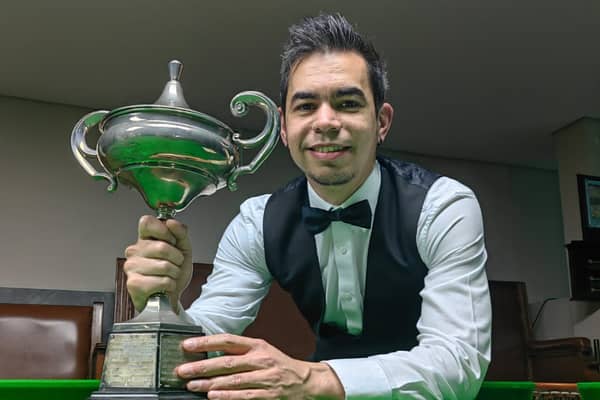 Michael Davids got his hands on the national trophy for the first time. Credit: Munier Cassim