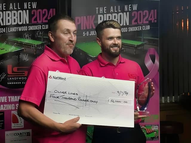 Oliver Lines stands with Landywood owner Paul Lloyd