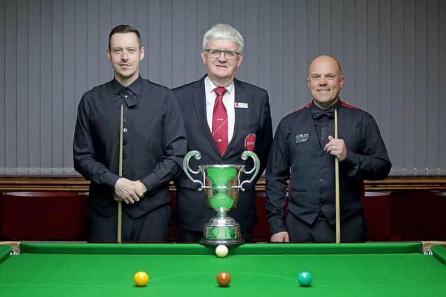 Zachary Richardson and Antony Parsons stand either side of referee Graham Mason before the 2025 English Amateur Snooker Championship final.