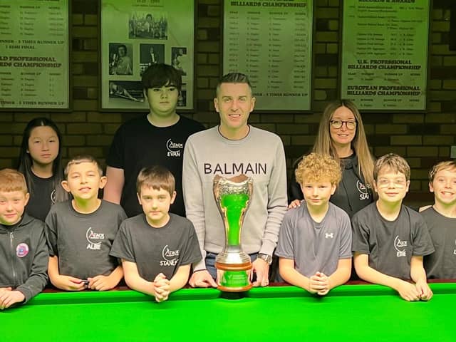 Mark Selby visited the Atack Snooker Club Junior Academy with the UK Championship trophy.