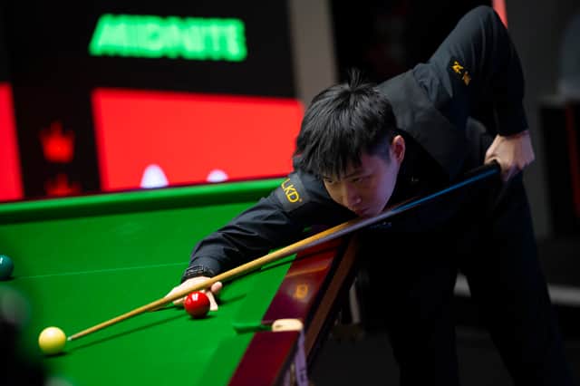 Zhao Xintong was made to work hard in a 10-7 opening day win over qualifier Liam Highfield.